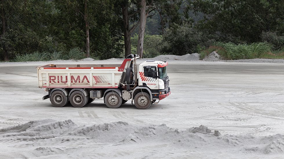 Riuma truck driving at the quarry. 